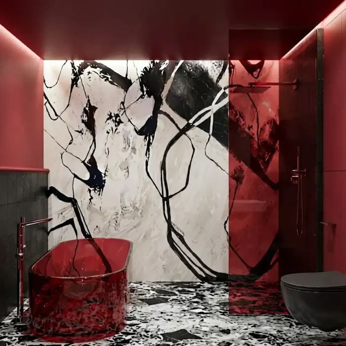 Nowoczesna czerwona łazienka z wolnostojącą wanną, czarną armaturą i marmurową ścianą akcentową, projekt wnętrza Bydgoszcz